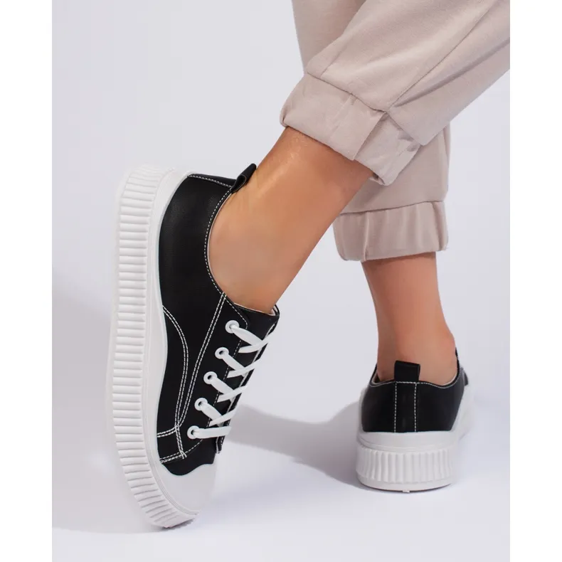 Black women's sneakers made of ecological leather