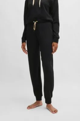 Cuffed tracksuit bottoms with signature-stripe drawcord