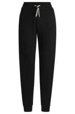 Cuffed tracksuit bottoms with signature-stripe drawcord