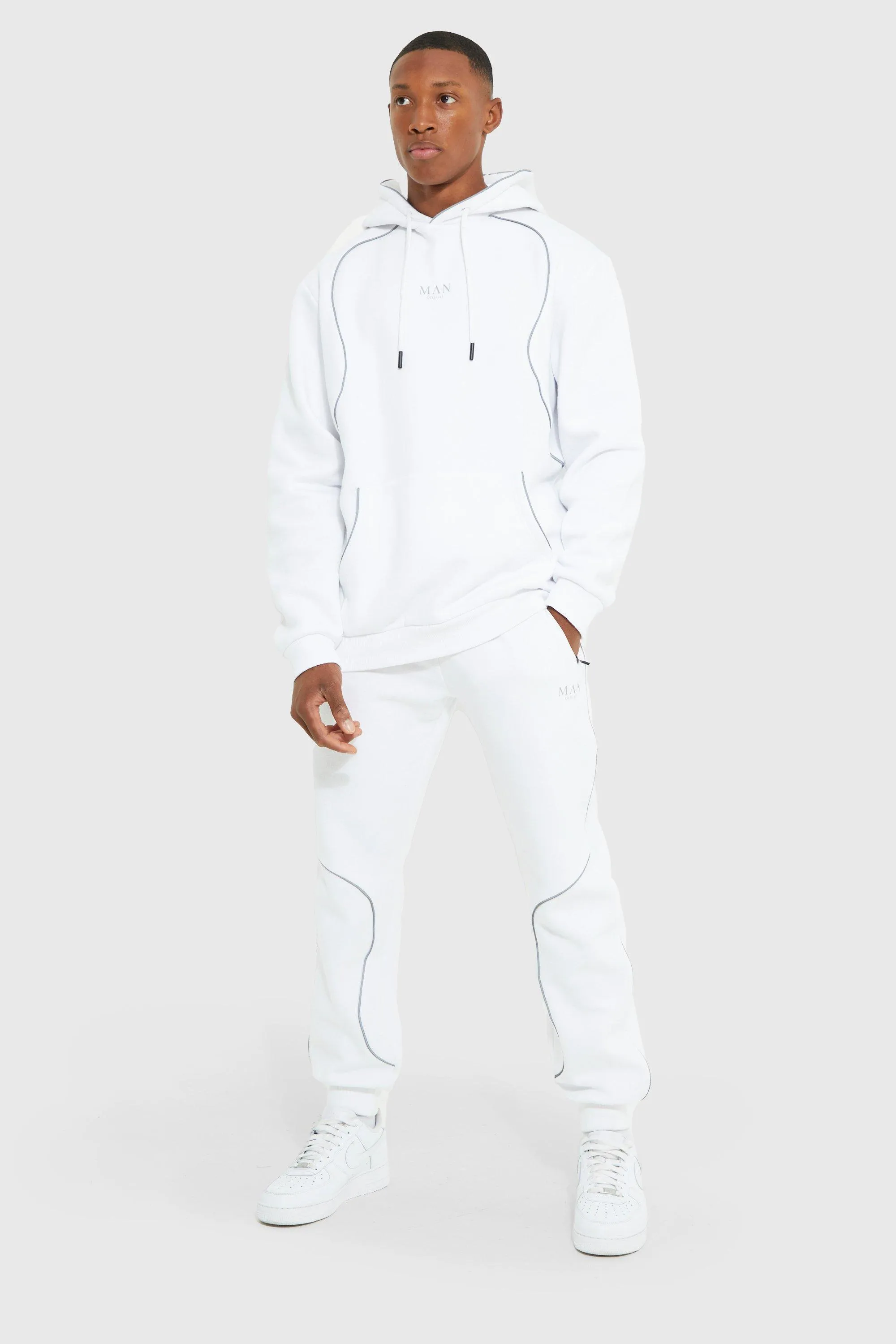 Man Hooded Tracksuit With Reflective Piping | boohooMAN UK