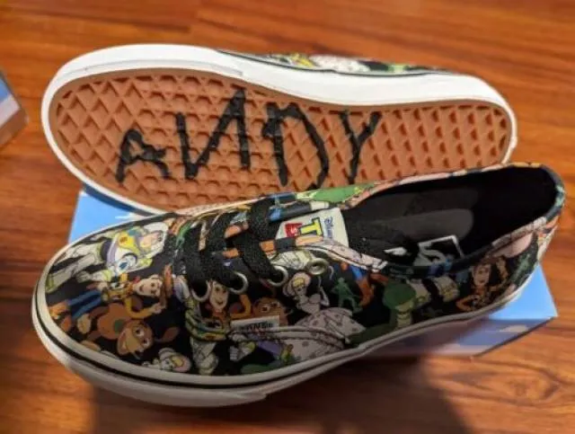 New vans x toy story authentic multi print black true white woody buzz women's