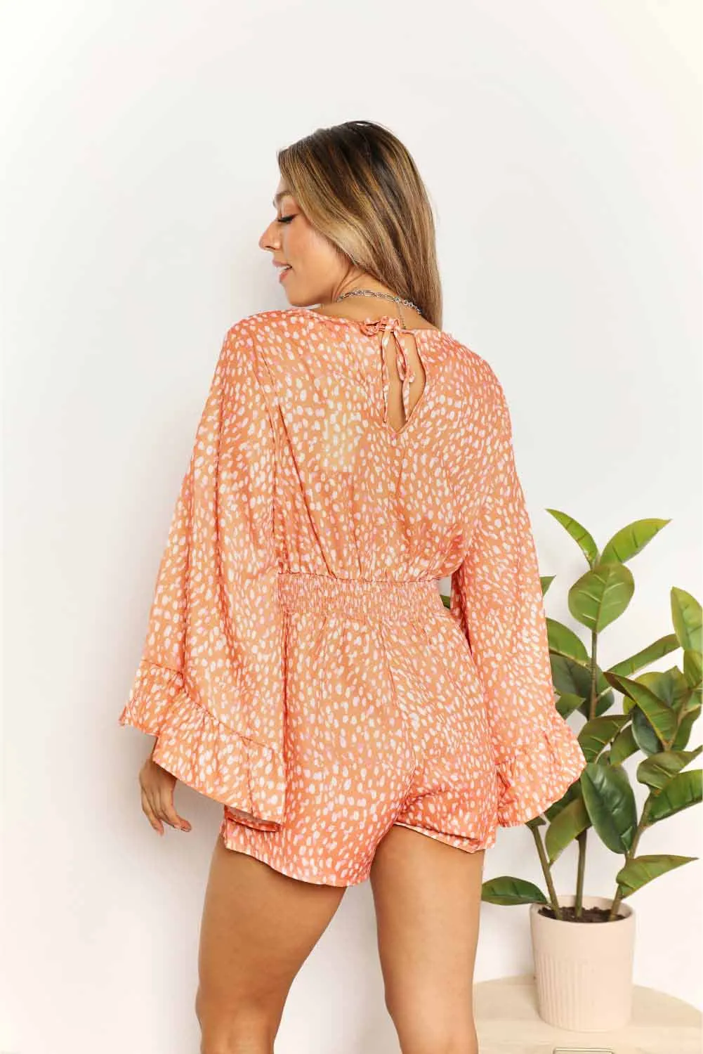 Printed Flare Sleeve Surplice Romper in Sherbert