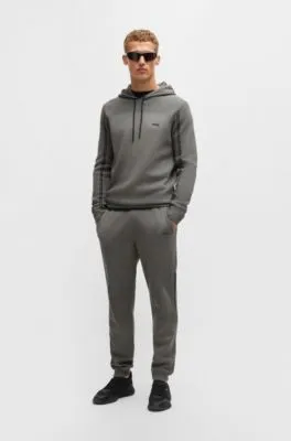 Regular-fit knitted tracksuit bottoms with stripes and branding