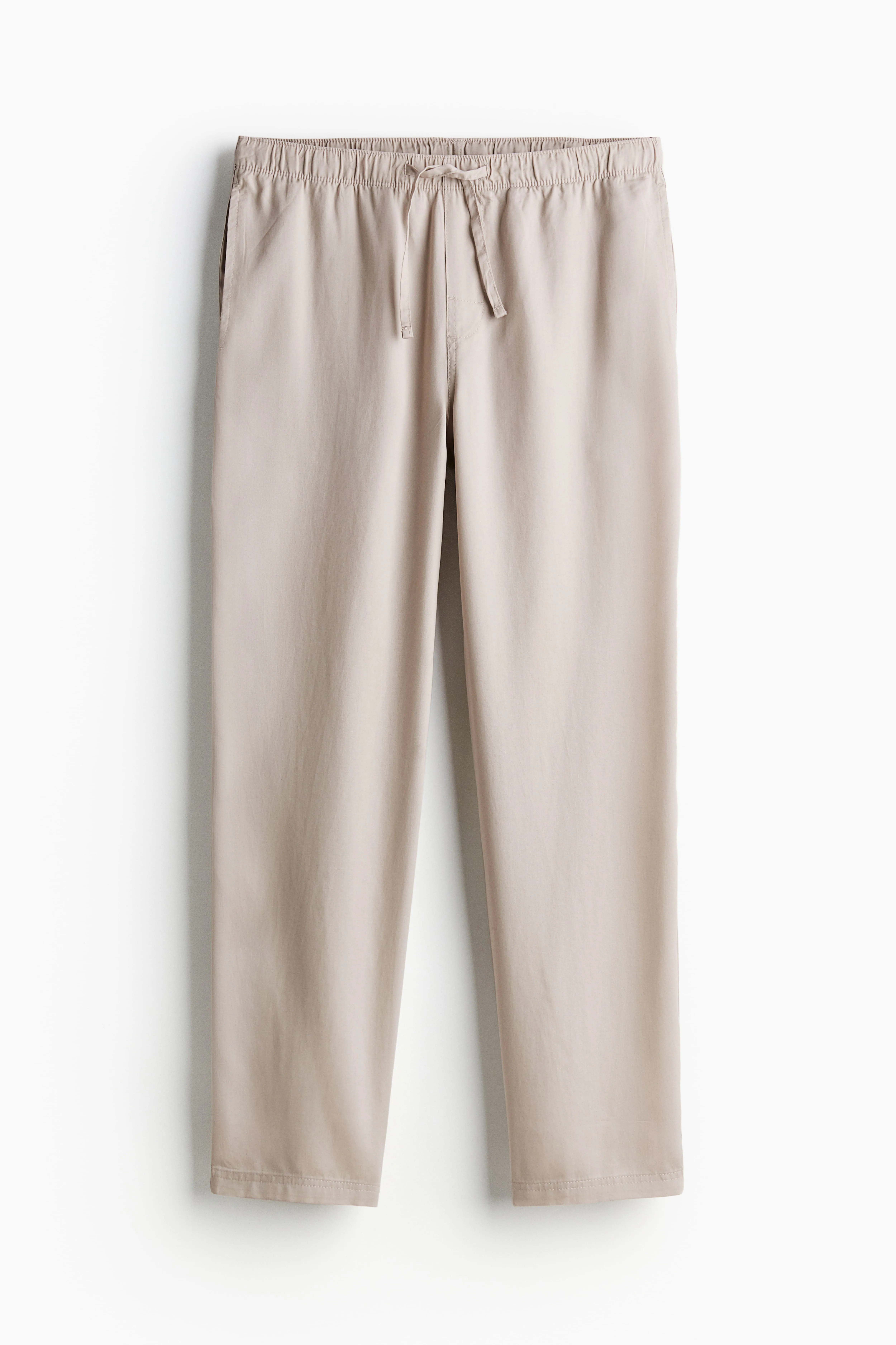 Regular Fit Lyocell joggers - Regular waist - Long - Beige - Men | H&M GB