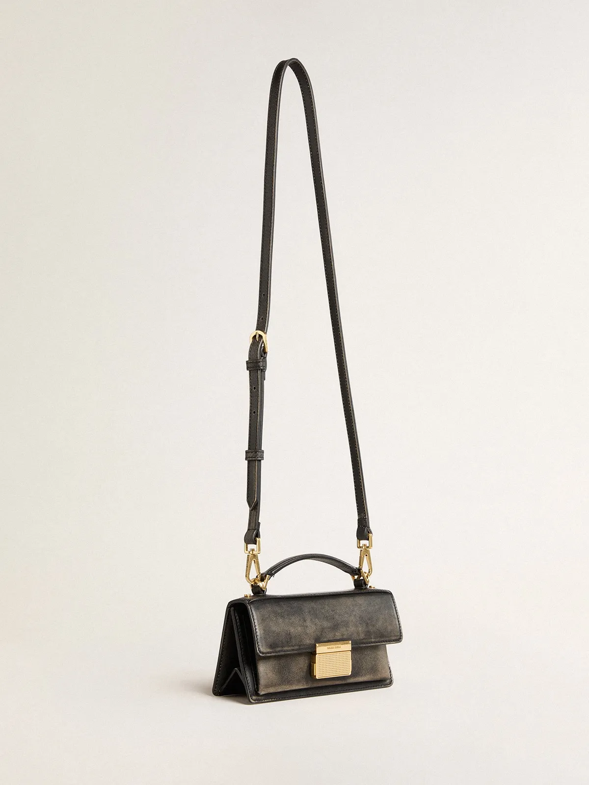 Small Venezia Bag in black distressed leather with gold details